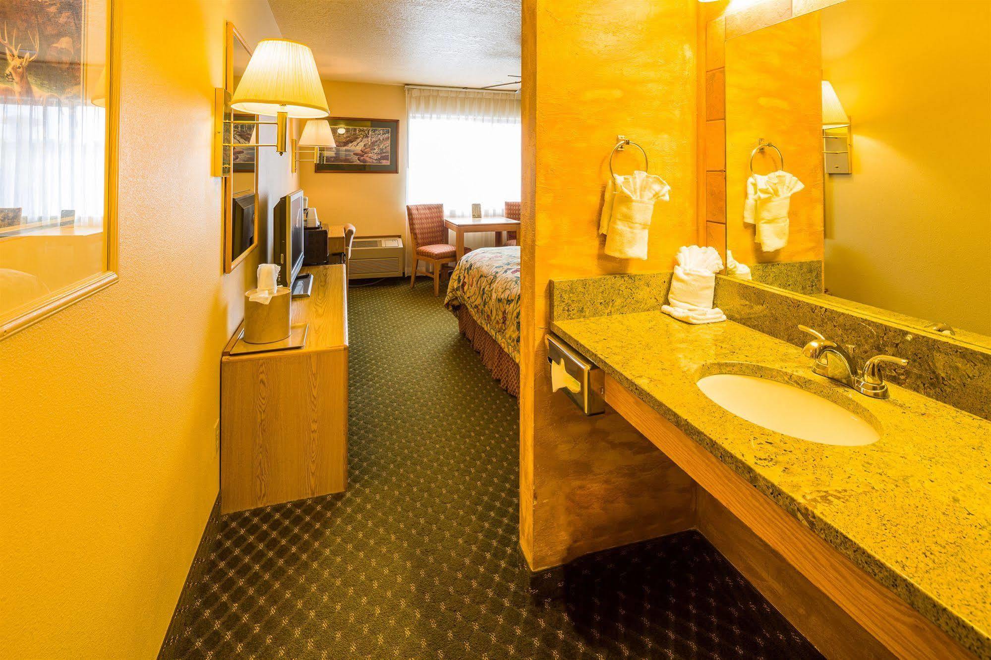 Alpine Inn & Suites Ганнисон Экстерьер фото